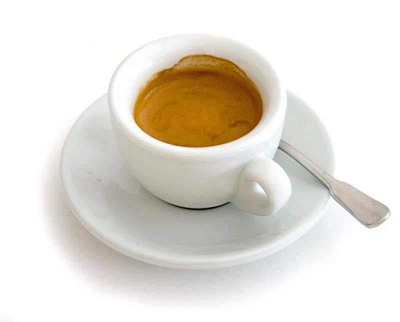 Cup And Saucer Filled With Tea
